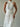 Nora Belted Lace Midi Dress - White